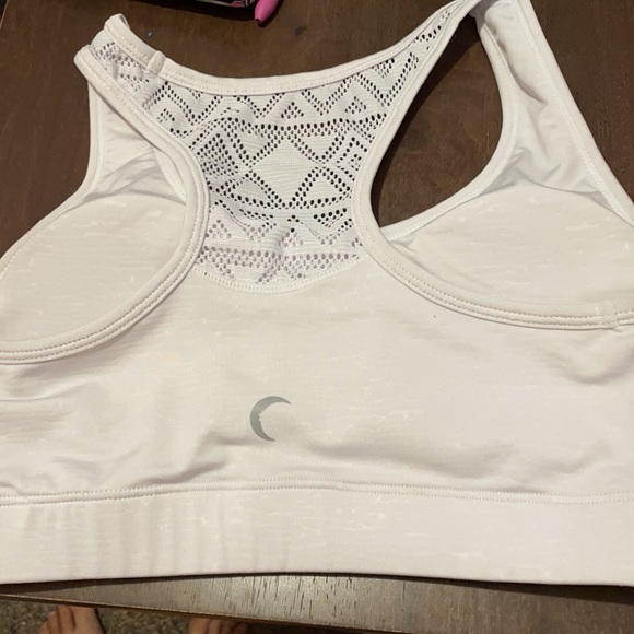 I am selling a white zyia bomber bra size small - Picture 2 of 9